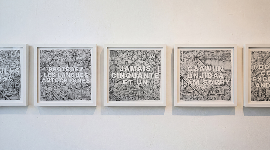 Five square artworks displayed next to each other in white frames on a white gallery wall